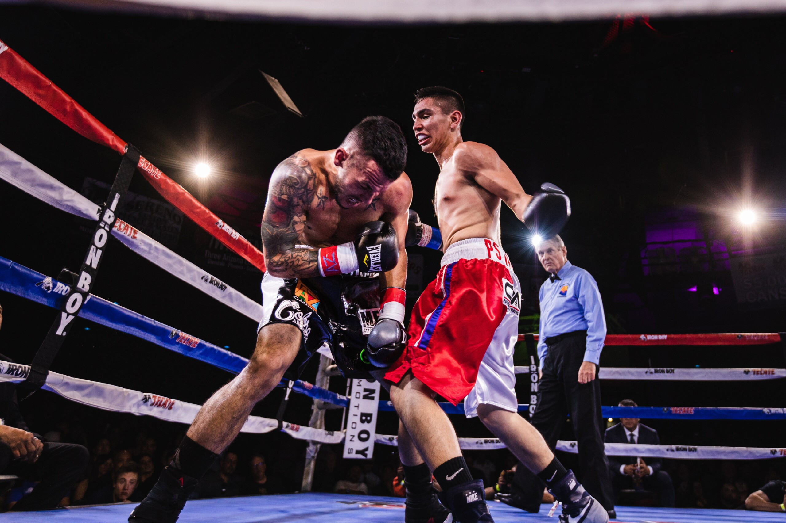 two fighters in a boxing ring